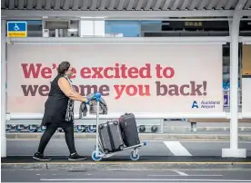  ??  ?? Welcome back to NZ — travellers from Australia are back.