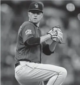  ?? Ben Margot, The Associated Press ?? Rockies starter Kyle Freeland pitches against the Giants in the first inning of Friday night’s game at AT&T Park in San Francisco. Solid starting pitching is one of the reasons for the Rockies’ success so far this season, despite their slumping offense.