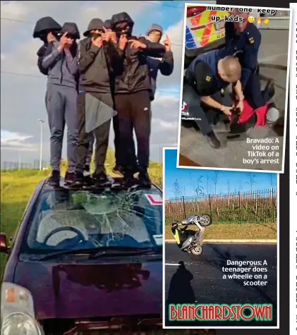  ?? ?? Dangerous: A teenager does a wheelie on a scooter
Destructio­n: Teenagers shield their faces while doing substantia­l damage to a vehicle