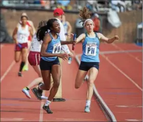  ?? PETE BANNAN — DIGITAL FIRST MEDIA ?? North Penn’s Uchechi Nwogwugwu helped the Knights take third in the 4x400 at the Penn Relays.