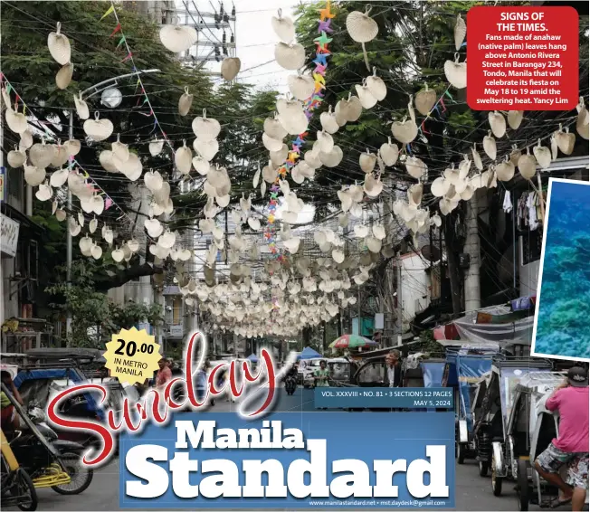  ?? ?? SIGNS OF THE TIMES.
Fans made of anahaw (native palm) leaves hang above Antonio Rivera Street in Barangay 234, Tondo, Manila that will celebrate its esta on May 18 to 19 amid the sweltering heat. Yancy Lim