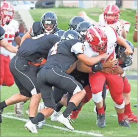  ?? Scott Herpst, file photo ?? The Lafayette defense converges on LFO running back Nathan Williams in this file photo from a preseason scrimmage game in 2017. The Ramblers and Warriors will be region opponents as part of 6-AAA this upcoming season. It will mark the first regular season meeting between the two programs since the 2009 season.