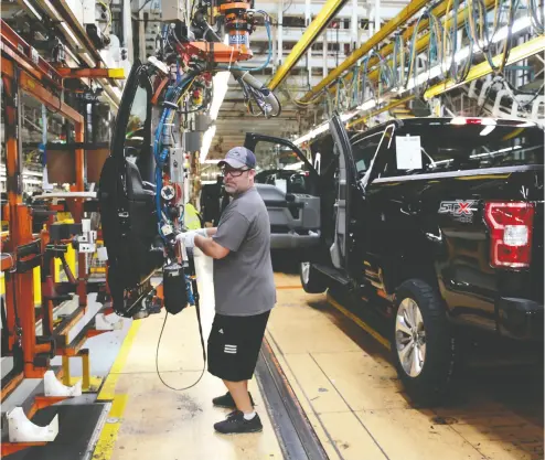  ?? Rebecca Cook / REUTERS files ?? Ford wants to crank up production at its F-150 truck plant in Dearborn, Mich., seen here in production of a 2018 model.