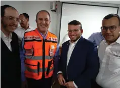  ?? (Courtesy) ?? ASHDOD MAYOR Yechiel Lasry, in the organizati­on’s distinctiv­e orangecolo­red vest.