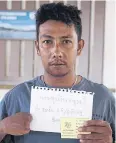  ??  ?? Tun Lin, an ex-human traffickin­g victim from Myanmar who lost four fingers during work on board, says he does not want others to experience the same misfortune.