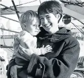  ?? Picture: AFP ?? EXECUTED: John Harris, left; on the right, his wife, Ann, arrives in the UK with their son, David, almost two years after the bombing