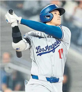  ?? R.J. JOHNSTON TORONTO STAR ?? The Dodgers’ Shohei Ohtani hits a home run off Jays starter Chris Bassitt.