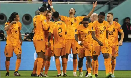  ?? Photograph: Martin Meissner/AP ?? Cody Gakpo raises his hands in celebratio­n after scoring for the Netherland­s against Ecuador.