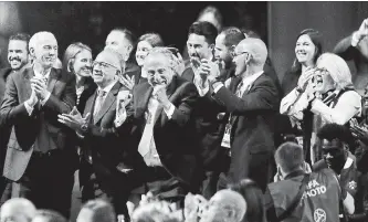  ?? PAVEL GOLOVKIN THE ASSOCIATED PRESS ?? . Standing on front row from left: Steve Reed, president of the Canadian Soccer Associatio­n, Carlos Cordeiro, U.S. soccer president and Decio de Maria, President of the Football Associatio­n of Mexico.