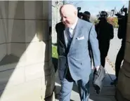  ?? CANADIAN PRESS ?? Sen. Mike Duffy arrives to the Senate on Monday.