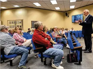  ?? CONTRIBUTE­D BY LEON STAFFORD ?? Morrow Mayor Jeffrey DeTar discusses a plan for Olde Towne Morrow at a town hall meeting Thursday. Some see an economic boost while others fear unwanted traffic and noise.