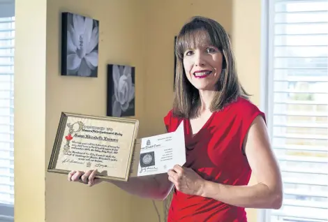  ?? JULIE JOCSAK/POSTMEDIA NEWS ?? Niagara Falls resident Susan Gallo was born July 1, 1967. Her parents received a special certificat­e from the City of Niagara Falls honouring her as a centennial baby. Gallo will celebrate her 50th birthday Saturday on the same day Canada celebrates...