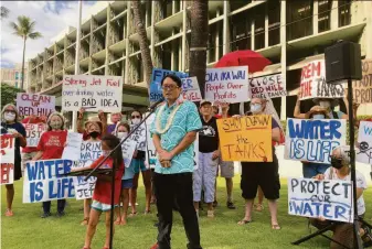  ?? Audrey McAvoy / Associated Press ?? Sierra Club of Hawaii Director Wayne Tanaka speaks at a rally in Honolulu on Nov. 24 that urged the military to close a vast fuel tank complex that has been the source of multiple leaks.