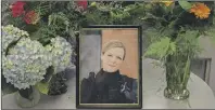  ?? File PHoTos ?? A maple tree served as a makeshift memorial for the public, following Catherine Campbell’s death in September 2015. At the police station fellow officers also paid their respects.