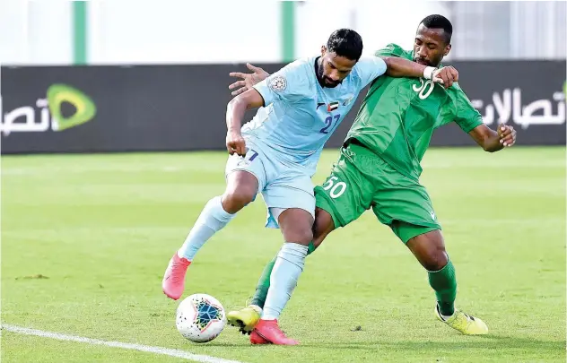  ??  ?? Khorfakkan and Bani Yas players in action during their Arabian Gulf League match on Thursday.