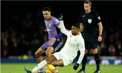  ?? ?? Trent Alexander-Arnold (left) in action at Arsenal on Sunday. Photograph: Andrew Matthews/PA