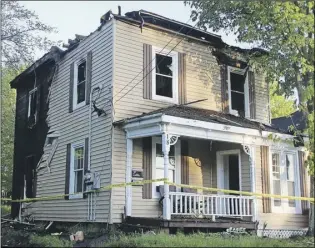  ?? Lynn curWin/truro daily neWs ?? A Laurie Street structure that housed four apartments was extensivel­y damaged by fire.