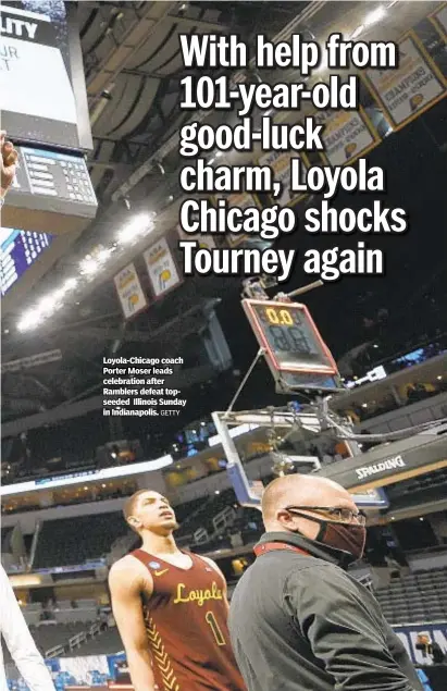  ?? GETTY ?? Loyola-Chicago coach Porter Moser leads celebratio­n after Ramblers defeat topseeded Illinois Sunday in Indianapol­is.