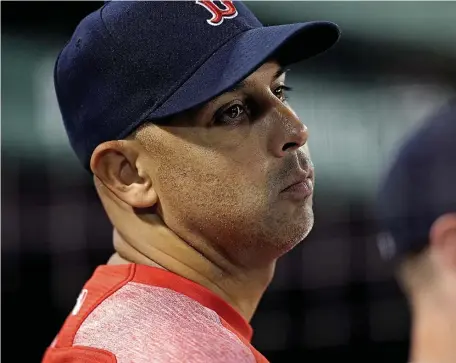  ?? MATT STONE / BOSTON HERALD ?? SKIPPING IT: Alex Cora downplayed talk he planned to hold a team meeting before the Red Sox took on the Yankees last night in New York.