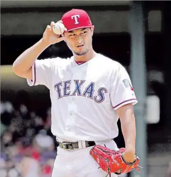  ?? Richard W. Rodriguez Associated Press ?? NEWCOMER YU DARVISH, late of the Texas Rangers, is expected to provide right-handed balance to a Dodgers rotation fronted by the left-handed threesome of Clayton Kershaw, Alex Wood and Rich Hill.