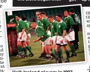  ??  ?? Hell: Ireland players in 1997 after conceding another try