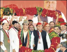 ?? PTI ?? Samajwadi Party president Akhilesh Yadav and other leaders at the party's national convention in Agra on Thursday.