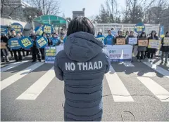  ?? EPA ?? A group of activists holds a rally in front of the defence ministry in Seoul, South Korea, yesterday, objecting to the planned deployment of Thaad in the country.