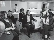  ?? ANDREW SPEAR FOR THE WASHINGTON POST ?? Mary Ann Hale, center, assistant superinten­dent and principal at West Elementary in Vinton County, talks about the opioid crisis at a panel of local educators and social workers at the McArthur United Methodist Church.