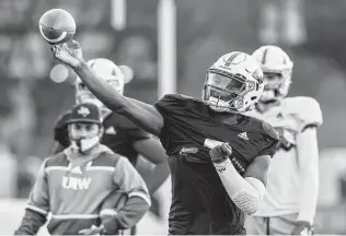  ?? Marvin Pfeiffer / Staff photograph­er ?? UIW quarterbac­k Cam Ward follows in the footsteps of former North Dakota State quarterbac­k Trey Lance, who also won the Jerry Rice Award as a freshman and was drafted No. 3 overall.