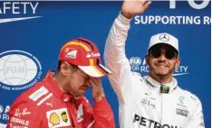  ?? Foto: Benoit Doppagne, dpa ?? Sebastian Vettel (links) war gestern nicht ganz zufrieden mit dem Verlauf des Ren nens, das sein Konkurrent Lewis Hamilton gewann.
