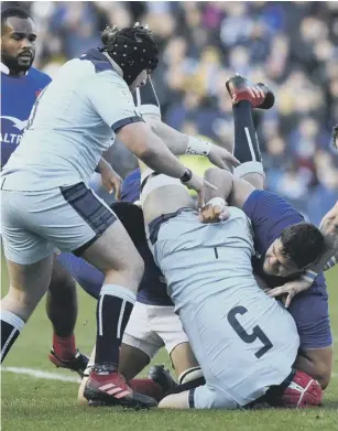  ??  ?? 0 France’s Paul Willemse escaped punishment for this tackle on Grant Gilchrist.