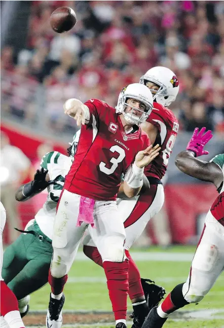  ?? — THE ASSOCIATED PRESS FILES ?? Quarterbac­k Carson Palmer and the Cardinals have been blown out at home by the Seahawks in their last two meetings. Palmer is nursing a hamstring injury but will play Sunday.