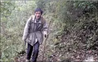  ?? DONG XIANWU / CHINA DAILY ?? Zhang Youguang, 65, has taken care of an area of mountain forests in Puding county in Guizhou province for 43 years.