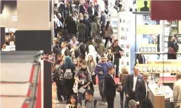  ??  ?? Visitors are pictured at the Frankfurt Book Fair on Oct 10.