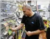  ?? BOB ANDRES / ROBERT.ANDRES@AJC.COM ?? Marietta convenienc­e store owner Tony Abufarha was served with an ADA lawsuit that cost him about $15,000 to settle.