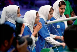  ?? AP ?? Rodaba Noori (left) Somayeh Faruqi, Kawsar Rashan and Lida Azizi at the FIRST Global Robotics Challenge in Washington. —