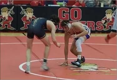  ?? COURTESY LORAIN ATHLETICS ?? Lorain’s Dan Findley, the son of new head coach Dan Findley, wrestles at the All-Star match at Elyria this past March.