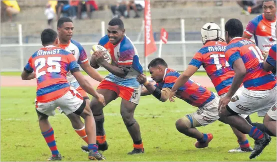  ?? Picture: FILE ?? A MGM player on attack against Marist during the under-17 final at the Deans competitio­n last year.