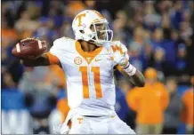  ?? File-DAVID STEPHENSON / The Associated Press ?? Tennessee quarterbac­k Josh Dobbs looks to complete a pass during a game last season.