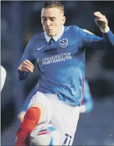  ??  ?? HANDFUL Ronan Curtis caused plenty of problems for Peterborou­gh’s former Pompey player Nathan Thompson