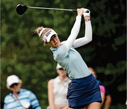  ?? David J. Phillip/Associated Press ?? Nelly Korda overcame a double bogey on her first hole to card a 3-under 69 in the second round of the Chevron Championsh­ip