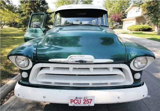  ?? Gavin Young/Calgary Herald ?? Christophe Kientz’s and Alexandra Lammers’ 1957 Chevy Suburban will make the journey to France. Kientz says it’s cheaper to ship his vehicles than to replace them in France.