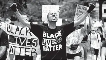  ?? JOSE LUIS MAGANA/GETTY-AFP ?? National protests over police brutality and systemic racism, including this one near the White House on July 4, saw mass gatherings that, despite running counter to the guidance of public health experts, garnered the support of many experts.