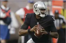  ?? AP PHOTO/BEN MARGOT ?? In this Aug. 31 file photo, Oakland Raiders quarterbac­k EJ Manuel (3) passes against the Seattle Seahawks during the first half of an NFL preseason football game in Oakland.