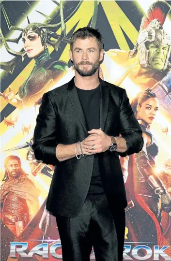  ?? CAROLINE MCCREDIE/GETTY IMAGES ?? Actor Chris Hemsworth attends the Thor: Ragnarok Sydney special event screening at Hoyts Entertainm­ent Quarter on Oct. 15, in Sydney, Australia.