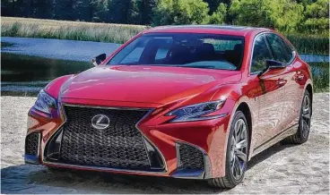  ?? Jeff Yip photo ?? Scheduled to arrive in February, the 2018 Lexus LS is longer, lower and bolder. Among the list of changes are slit-type projector headlights and a new twin-turbocharg­ed V6 rated at 416 horsepower.