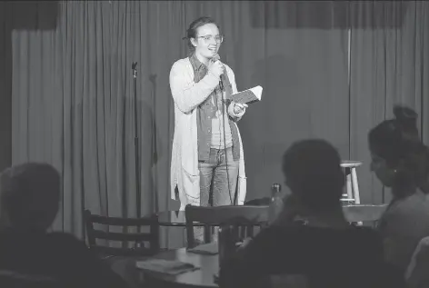  ?? CHRIS YOUNG/THE CANADIAN PRESS ?? Kathleen Smith practises her material during a female-only comedy class at the Comedy Bar in Toronto. Classes like these are aimed to inspire teen girls and women to be bold, brave and show self-confidence.