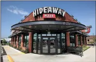 ?? Arkansas Democrat-Gazette/MITCHEL PE MASILUN ?? The Hideaway Pizza on Warden Road in North Little Rock opened in October.