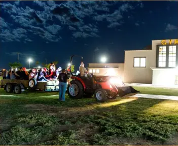  ?? PHOTO VINCENT OSUNA ?? a “ghost hunt” tractor ride that was available for guests to enjoy during Calipatria High School’s fifth annual Fall Harvest Festival held Saturday night.