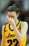  ?? (AP/Darron Cummings) ?? Iowa’s Caitlin Clark reacts during the second half of Thursday night’s game against Indiana at Bloomingto­n, Ind. Clark finished with 24 points, 10 assists and 9 rebounds but struggled from the floor as the No. 4 Hawkeyes lost to the No. 14 Hoosiers.